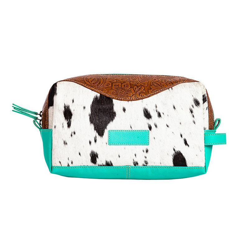 Turquoise leather make up case. Tooled leather. Hair on hide. Cowhide. Cosmetic case. Western Style. Boutique. Small business. Woman owned business. 