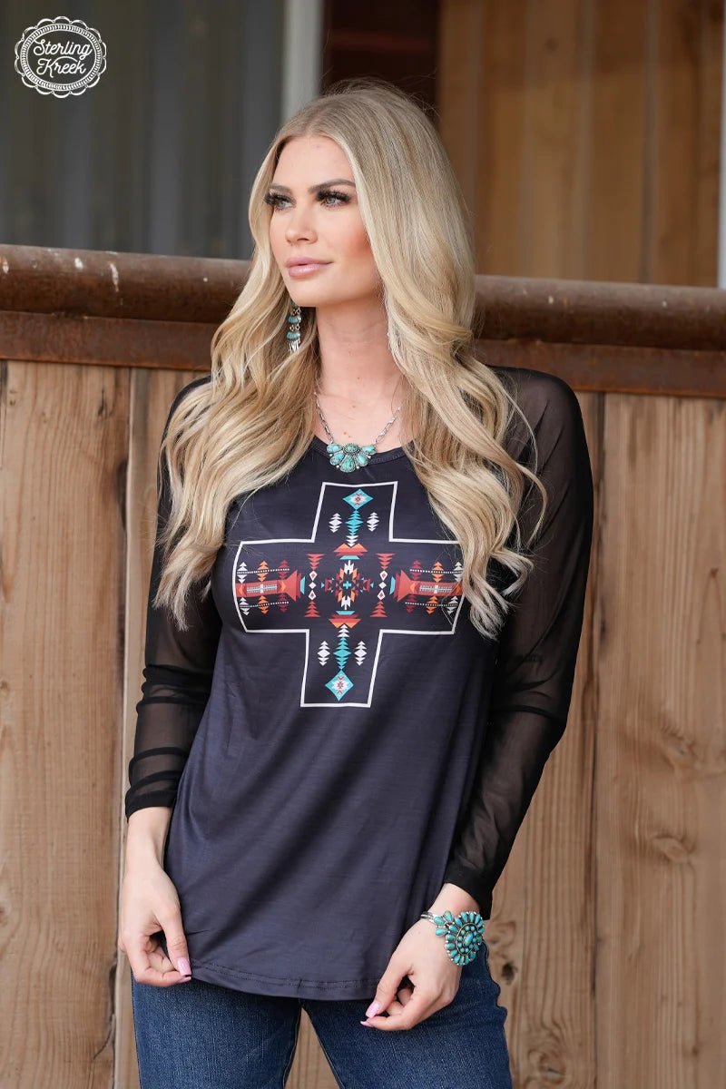 Sterling Kreek top. Women's top. Black top with sheer sleeves. Aztec top. Women's western style. Women's western wear. Women's western top. Women's western boutique. Sheer sleeve top. Black top. Small business. Woman owned. Fast shipping from Texas.
