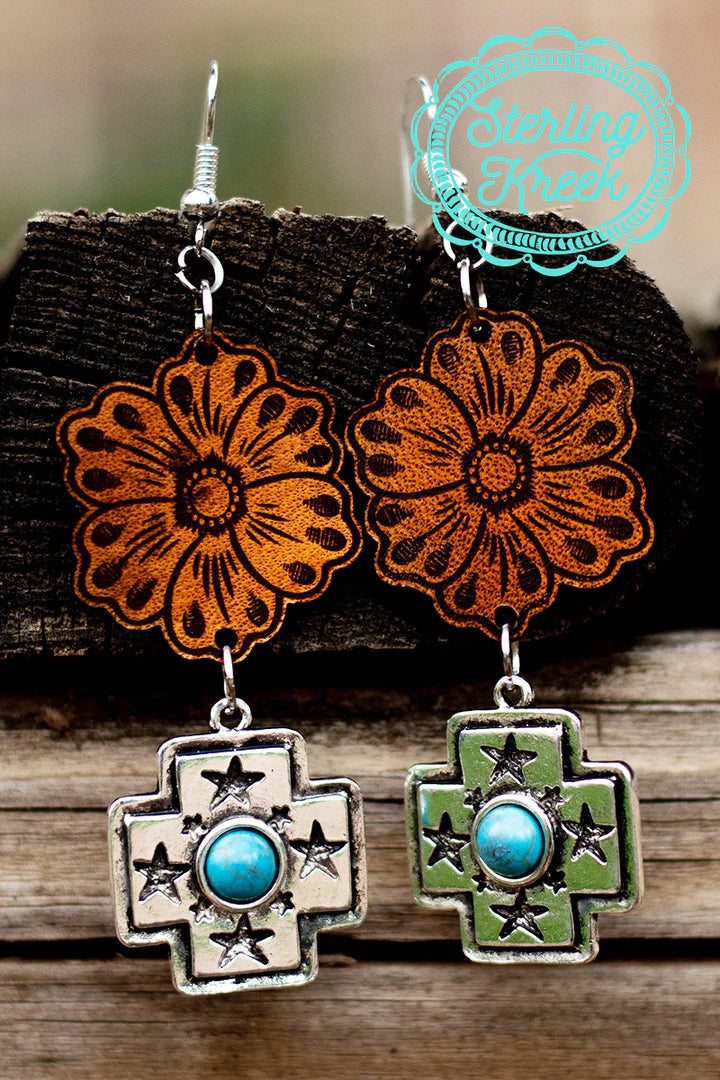 Texas Tooled Earrings are a 2" Dangle Tooled Flower and a Silver Cross with Turquoise Stone. The Earrings are super lightweight with a fish hook back.
