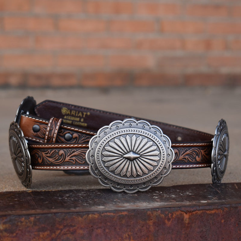 filigree tooled brown leather belt with scalloped conchos.