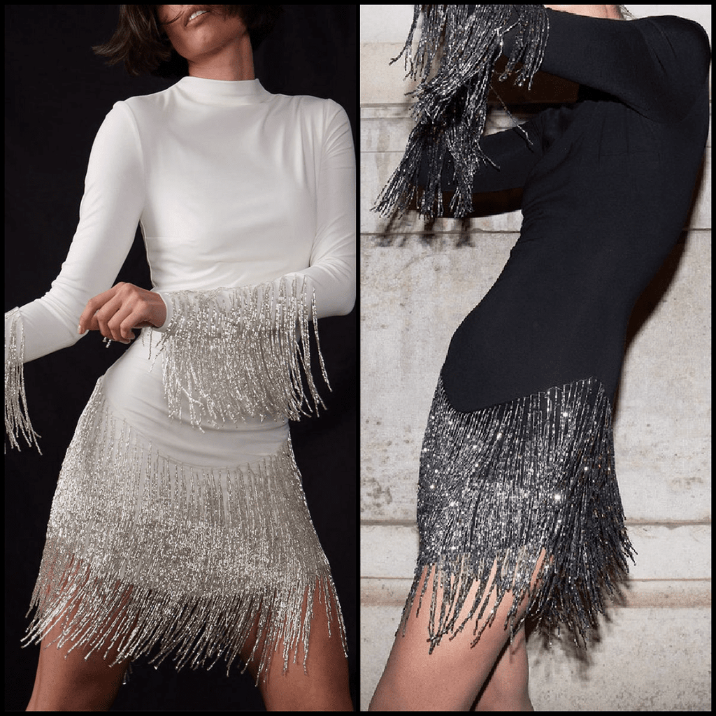 Make a bold statement in The Shania Fringe Dress! With glimmering silver tinsel style fringe tassels, this lightweight long sleeve dress will sparkle at any special event or party. Feel confident in the timeless high neck style, perfect for dazzling rodeo, concerts, or fancy dress events. Show your style and stand out from the crowd!