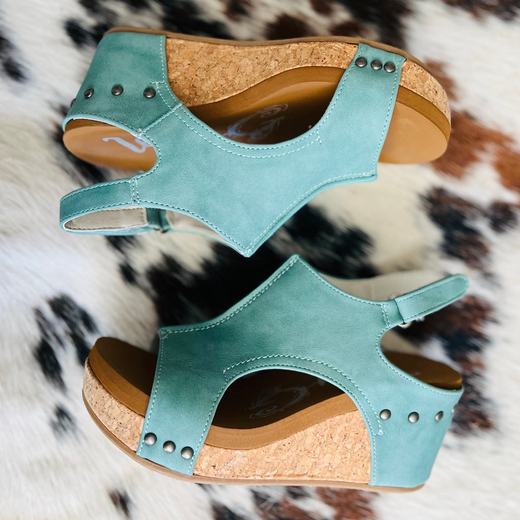 These wedges are perfect for an afternoon in London or even a barbeque with your friends! These wedges are so sleek and beautiful and perfect for warmer weather!  3" heel and adjustable strap