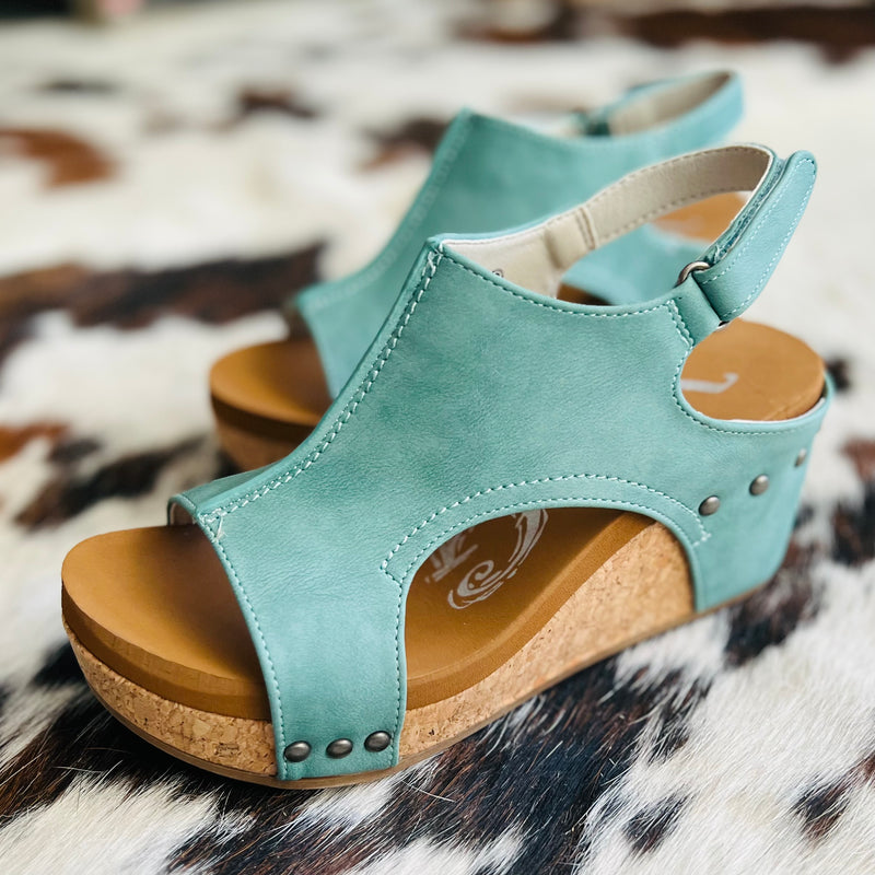 These wedges are perfect for an afternoon in London or even a barbeque with your friends! These wedges are so sleek and beautiful and perfect for warmer weather!  3" heel and adjustable strap