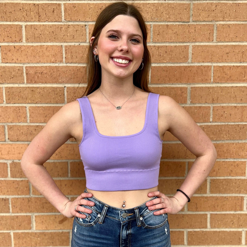 Our Talk Of The Town Tank Top is the perfect staple piece for your wardrobe. With a ribbed texture and a square neck, it’ll pair perfectly with all your favorite bottoms. Plus, the built-in bralette gives you the extra coverage you need and comes in multiple colors to match your unique style. Ready to take on the town?  90% Nylon, 10% Spandex  **S/M & L/XL sizes available**