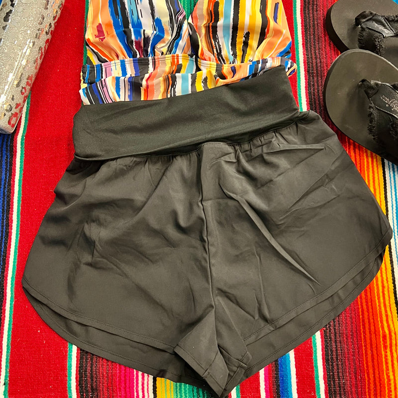 Summer Days Shorts are lightweight and comfortable, designed with a high waisted, fold over band, split hem, and relax fit. Built in brief ensures secure coverage for running and other activities. Enjoy your summer days with a perfect fit.