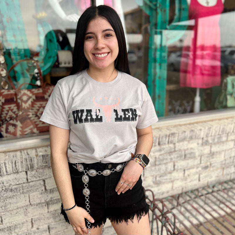 The Wallen Concert Tee is your go-to for concert day. Its lightweight, relaxed fit provides all-day comfort and breathability. The grey graphic shirt features the Wallen Concert Tee logo across the chest. Crafted with care, it’s the perfect addition to your wardrobe.
