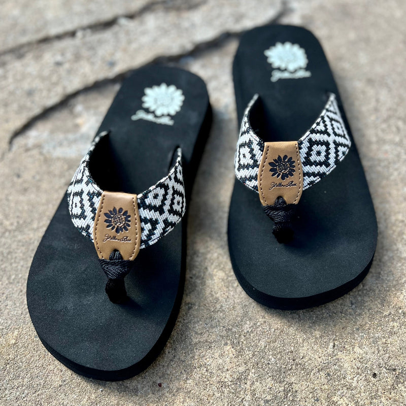 FILANA BLACK AZTEC FLIP FLOPS are the perfect sandal for the summer. Featuring a black color scheme and ethnic AZTEC print, these flip flops offer comfort and style. Constructed with a flexible sole and lightweight cushioning footbed, you'll be able to wear them all day in total comfort.