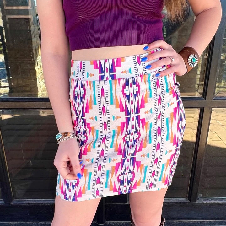 Brighten up your wardrobe with the PLUS size River Run Skirt. This mini skirt features a cheerful multi-colored Aztec print and is made of 100% Polyester, ensuring durability and wearability. Perfect for casual or formal occasions.