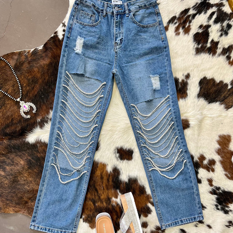 Rhinestone medium wash jeans. Rhinestone distressed straight leg jeans. Ripped straight leg jeans. Women's trending jeans. Western boutique. Online boutique. Small business. Women's western wear. 