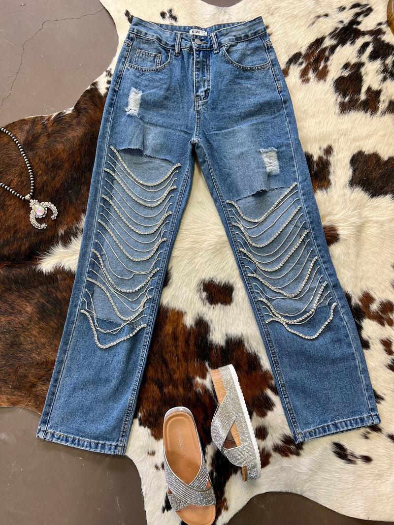  Rhinestone medium wash jeans. Rhinestone distressed straight leg jeans. Ripped straight leg jeans. Women's trending jeans. Western boutique. Online boutique. Small business. Women's western wear. 