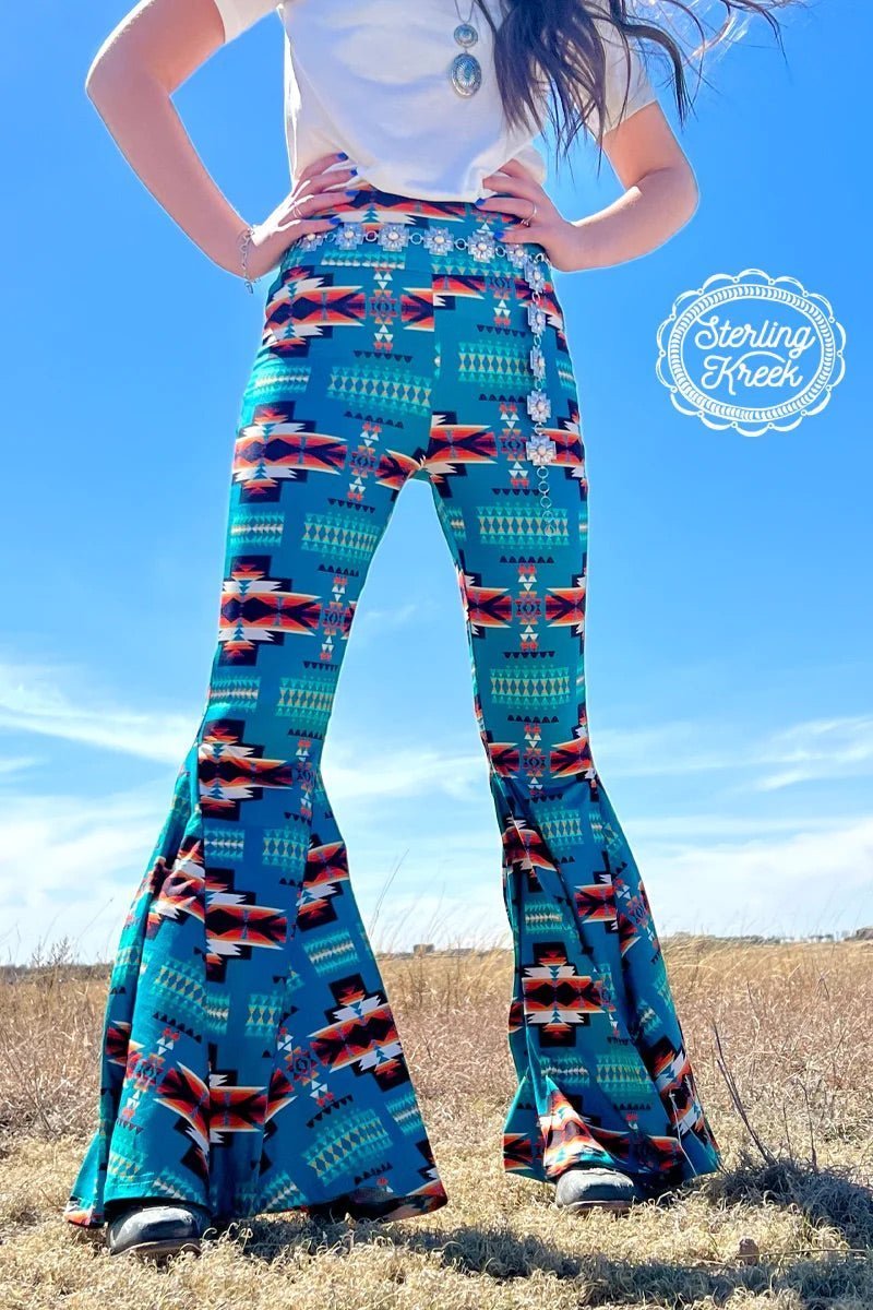 Be a style trailblazer and show off your chic style with the APPALACIAN BLUES BELLS! Featuring a unique blue aztec printed pattern, these bells are sure to make you the trendiest one around. Add this set of bells to your accessory collection and stand out from the crowd!   92% POLYESTER 8% SPANDEX