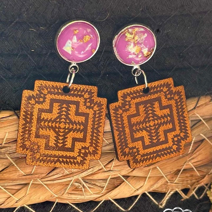 2"  Dangle earring with a gorgeous lavender and gold speckled stone with a leather aztec piece hanging from it. The Earrings are super lightweight with a fishhook back.