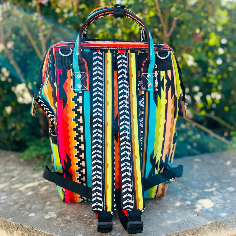 The Aztec Warrior Diaper Bag is very roomy and bright and beautiful. This bag has multiple zipper pockets and cubbies to put necessities.  13" L X 8" W