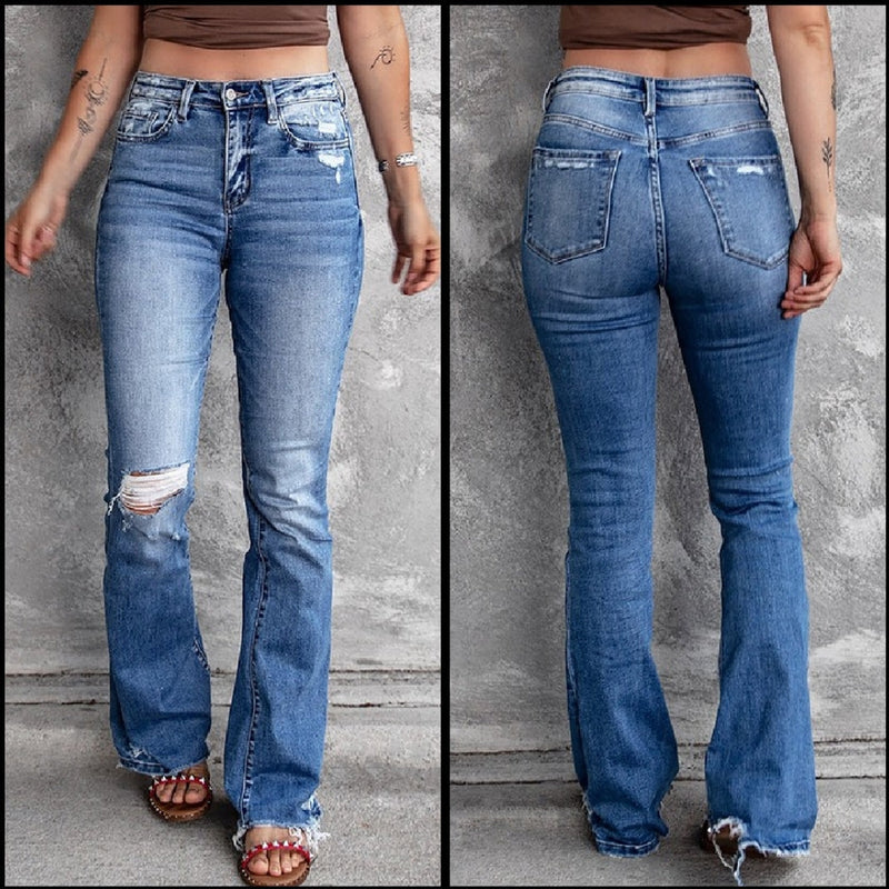 Medium wash bootcut jeans. Distressed bootcut jeans. Ripped denim jeans. Women's western wear. Women's western fashion. Online boutique. Small business. Woman owned.