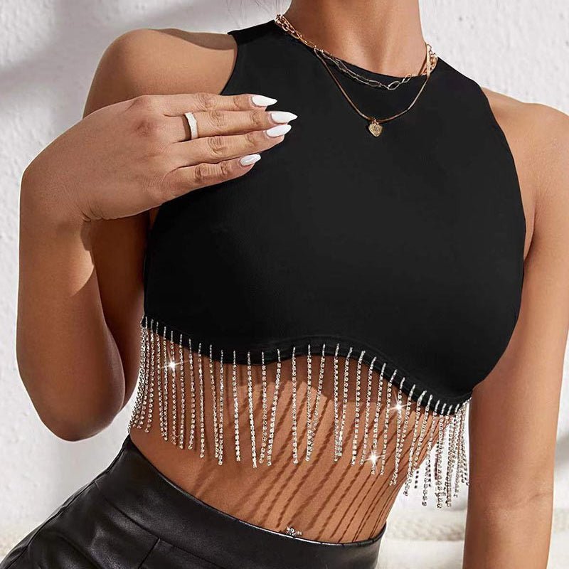 Make a statement with this daring crop top! The dazzling rhinestone fringe brings a glimmer to the room, perfect for your next fancy event. Zip up the back to embrace a flattering silhouette, then step out and sparkle!  Fabric Contents 95% polyester,5% spandex