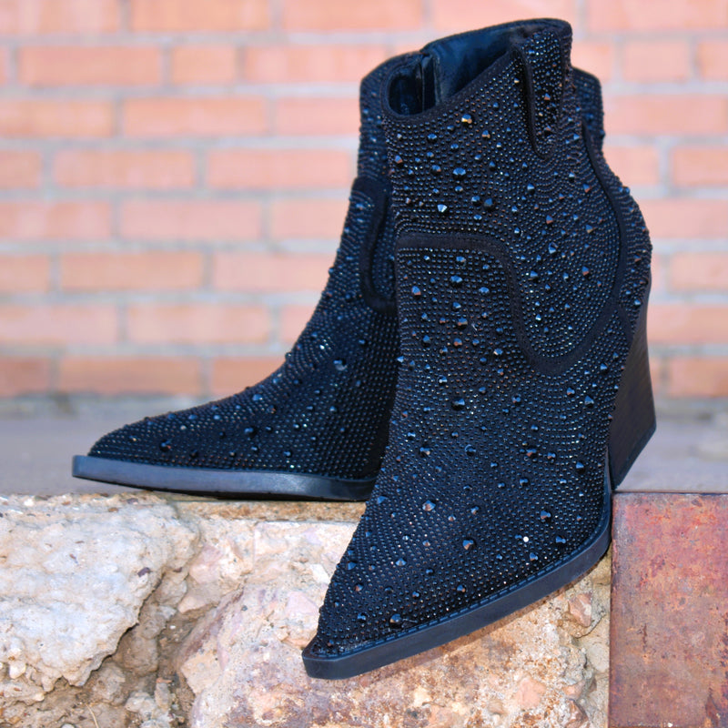 Add Glamour to any party with these "Kady" Black Rhinestone Booties with allover rhinestone detailing. Pointed Toe Silhouette,  side zipper closure, 3" wooden block heel, 5" ankle length from ankle to top of bootie. 8 1/2" total inches tall from sole to top of Bootie. 