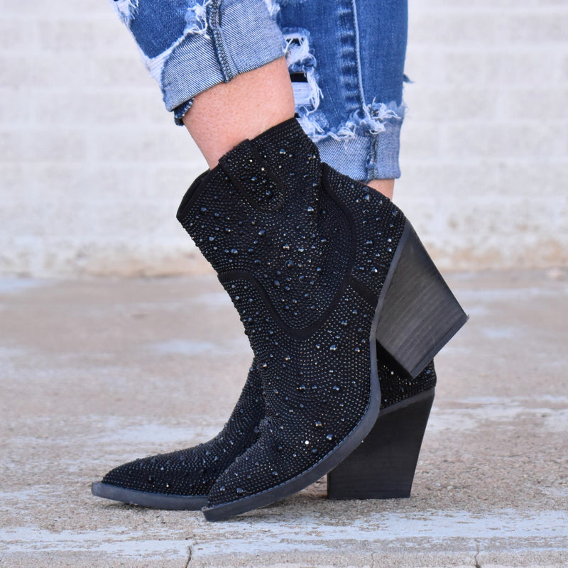 Add Glamour to any party with these "Kady" Black Rhinestone Booties with allover rhinestone detailing. Pointed Toe Silhouette,  side zipper closure, 3" wooden block heel, 5" ankle length from ankle to top of bootie. 8 1/2" total inches tall from sole to top of Bootie. 