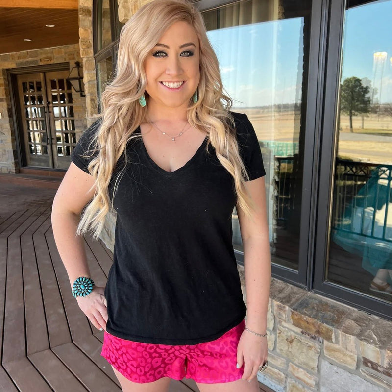 These Color Me Rosey Shorts are the purrfect way to hit the streets. Feel like royalty in this pink cheetah print with a silk-like feel and spacious pockets--royalty never carries a purse anyway. Live out your wildest dreams and show 'em what you're made of!   97% POLYESTER 3% SPANDEX