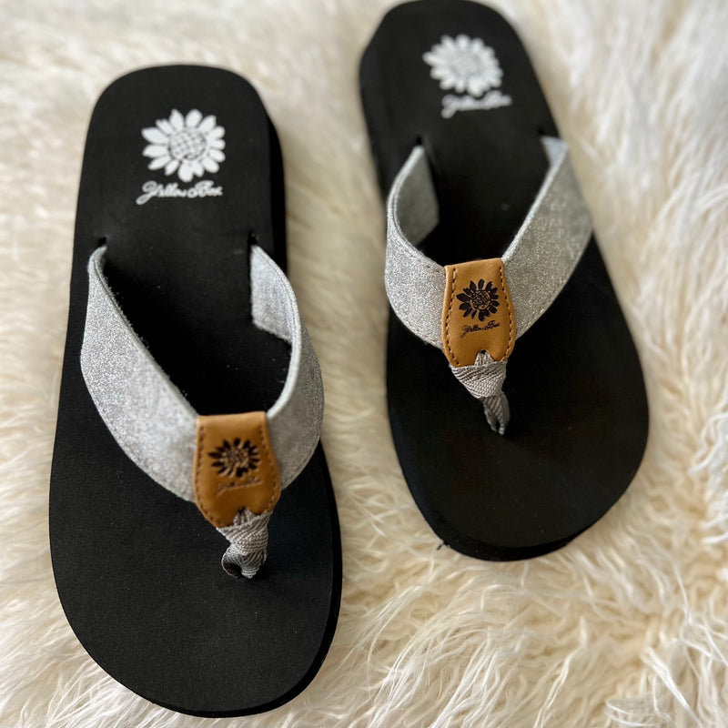 Slink into style with these eye-catching Silver Glittered Leopard Flip Flop Sandals from Yellow Box. With true-to-you sizing, these trendy kicks are cubed with a foam footbed and rubber sole, giving you all the comfort and sass that you need! Put the exclamation point on your outfit!
