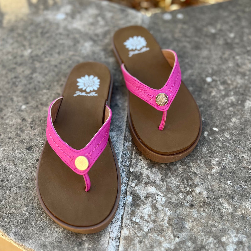 The Fallen Fuchsia Flip Flop is ready for a summer of fun. Whether you’re strolling the boardwalk or lounging in the backyard, Yellow Box’s cushiony footbed and durable hard rubber sole make these sandals a comfortable go-to for your everyday summer adventures. And their eye-catching fuchsia color will make you the envy of all your sandal-shuffle-stepping pals!  True to size