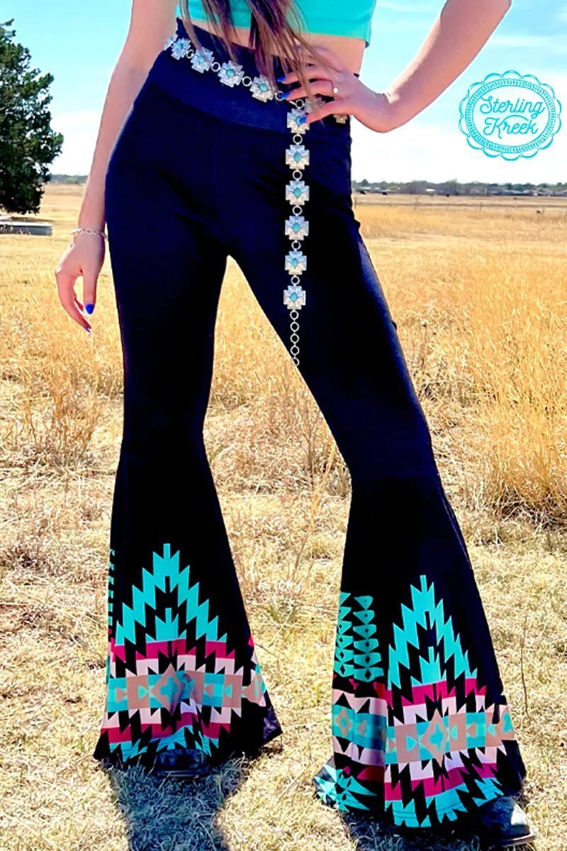Make a statement with these NEW HOME TOWN BELLS! These solid black bell bottoms add the perfect touch of edginess to your outfit, complete with an aztec-inspired printed bottom that won't go unnoticed. Add a little boom to your style!     92% POLYESTER 8% SPANDEX
