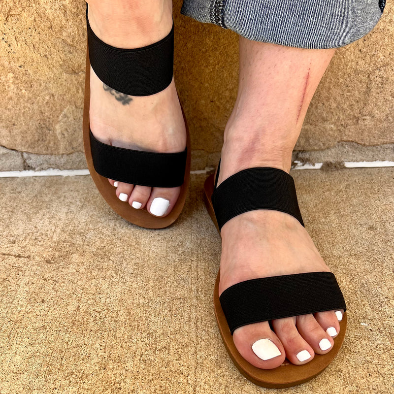 Take a stroll in style with these "A Walk In The Park" sandals! With an elastic stretchy strap and mini platform, you can strut around town in comfort and poise. Perfect for casual everyday wear and sure to amp up your style with its chic sling-back design. Look good while feelin' good!