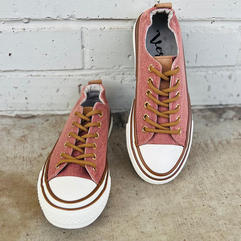 These sneakers are not only cute and stylish, but the comfy as all get out! The super cushioned foot bed offers optimal comfort. Ideal for everyday wear. The rubber sole ensures stability with every step. The upper shoe is a rust/light red color and is a canvas like material. 