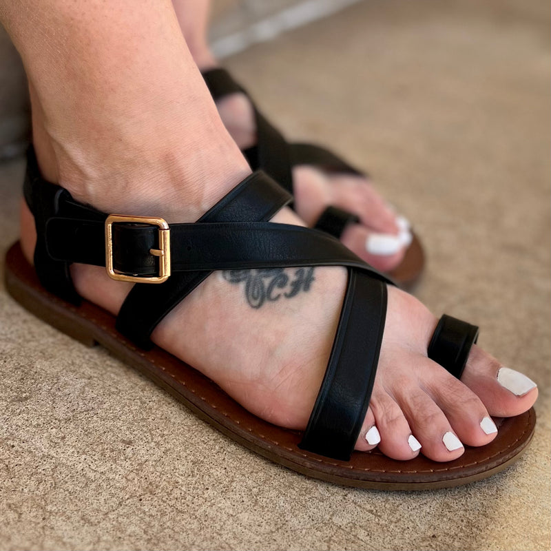 Make a statement with these "Walk On The Beach" sandals! Perfect for any vacay destination, these sling back sandals come in two chic colors - chestnut brown and black - and feature a toe ring for summery style. Plus, with an extra comfy cushion footbed, you can wear 'em all day and into the night! Ready, set, sea-yah!