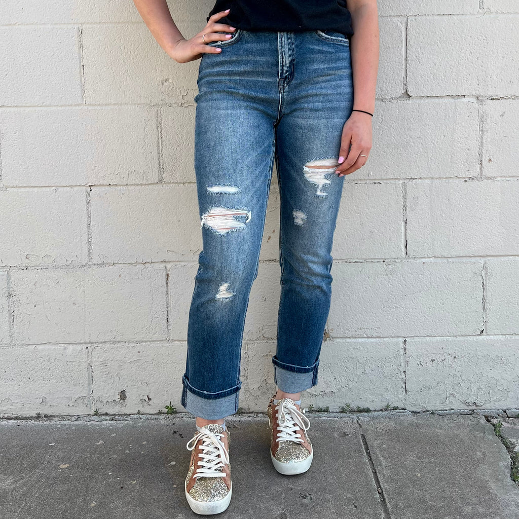 Cuffed Mom Denim Jeans are the perfect combination of fashion-forward and comfort: stylishly distressed and cuffed, with a flattering fit that's also super comfy. Get ready to wow! (And maybe even breakdance.)  Rise: 11.25"  Inseam: 26.5" 