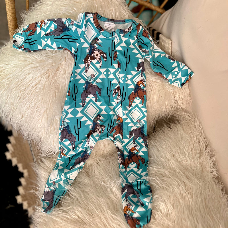 This western style bucking bronc and cowboy footed sleeper is so dreamy! Milky silk feel with zipper makes it easier to dress and undress (even for those midnight changings).   True to size   95% Cotton, 5% Spandex