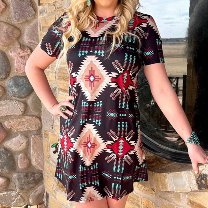 Be bold and beautiful in this Virginia Bluebell Dress! This black and cream stunner features stunning pops of red and turquoise, making you the life of the party in no time. Let your style bloom in this gorgeous dress! This dress comes in a matching kids dress, and a cute tee for your little boys!  26% cotton, 69% polyester, 5% spandex 