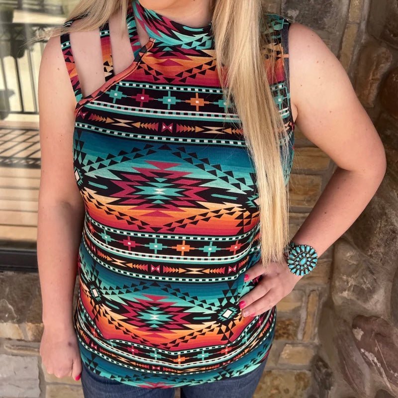 Chill in Luckenbach, Texas with this tank that has personality to spare. The AZTEC design with a high neck line and cut outs on one shoulder make for a stylish yet comfy piece you can rock at any event! So throw on your Luckenbach Lovin' Tank and enjoy the good vibes!  50% POLYESTER 45% COTTON 5% SPANDEX