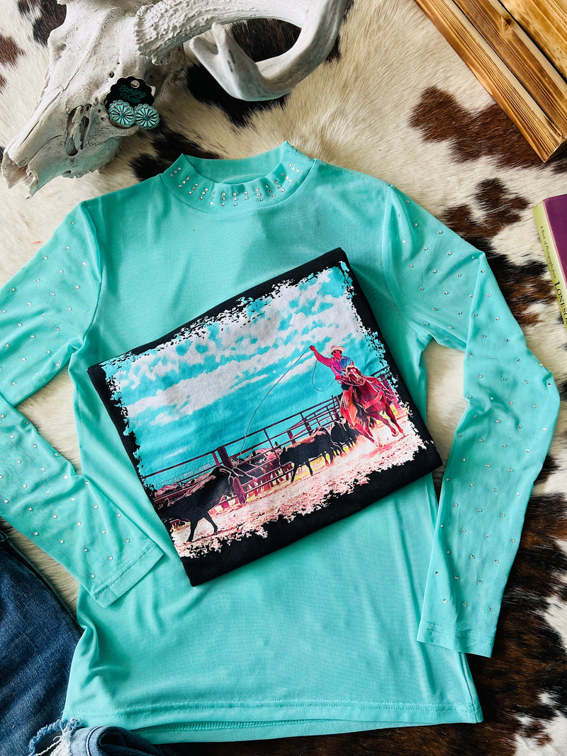 Make heads turn in our Turquoise Trouble Top! This fun and feminine piece features a turquoise long sleeve mesh top with rhinestones on the arms and neckline for that extra "wow" factor. So why wait? Pop it on, sparkle your way out the door and make your own turquoise trouble!  96% POLYESTER 4% SPANDEX