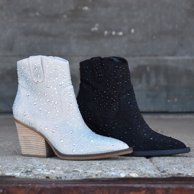 Add Glamour to any party with these "Kady" Silver Rhinestone Booties with allover rhinestone detailing. Pointed Toe Silhouette,  side zipper closure, 3" wooden block heel, 5" ankle length from ankle to top of bootie. 8 1/2" total inches tall from sole to top of Bootie. 