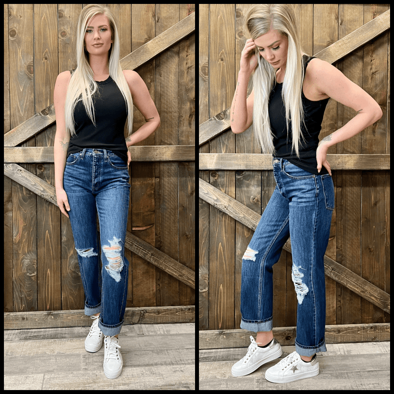 Ultra high rise 90's wide leg boyfriend jeans with knee rips and distressing. Covered button fly.  100% Cotton  11.5" rise, 30" inseam    