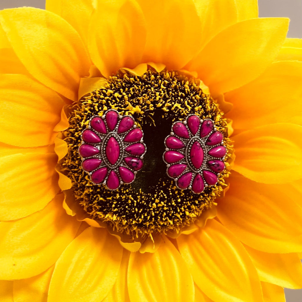 The Cooper Leigh Pink Multi Stone Squash Blossom Earrings are Beautiful. The pink stones set in the silver background make these earrings pop. They are 1" W X 1.5"L and  are so lightweight. They will add lots of color and be beautiful with any outfit!!
