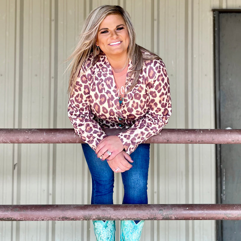 This PLUS Size Leopard Born Wild Blazer is a SHOW STOPPER!! It would be precious dressed up or casual. The Tri Color Leopard Print is the real deal. You wont be disappointed with this blazer. The turquoise and Silver Concho Buttons make this Blazer shine!!!  90% Polyester, 10% Spandex  XL,2XL,3XL