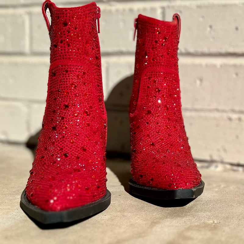 Add Glamour to any party with these "Kady" RED Rhinestone Booties with allover rhinestone detailing. Pointed Toe Silhouette,  side zipper closure, 3" wooden block heel, 5" ankle length from ankle to top of bootie. 8 1/2" total inches tall from sole to top of Bootie. 