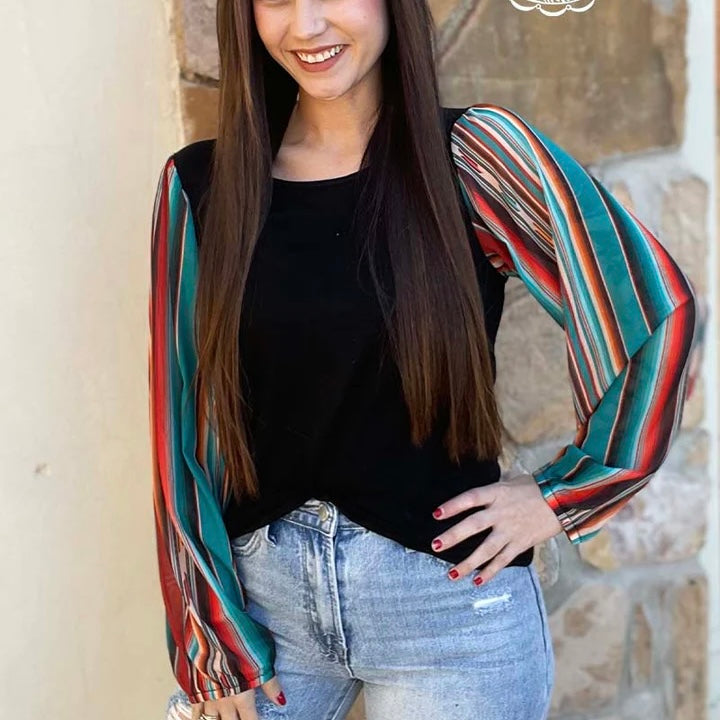 This Show Pony Top by Sterling Creek is beautiful. The gorgeous fall color stripes and aztec print sleeves are sure one to catch the eye. The fabric is butter soft and a top you would be comfortable in all day.  94% Modal, 6% Spandex  XS, S, M, L, XL