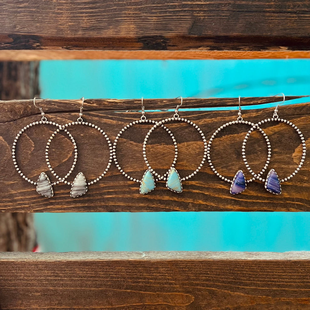 These Yabba Dabba Hoops are a 2" silver hoop with a single colored stone. These hoops with the stone are 2 1/2" in total length. They are precious!! 